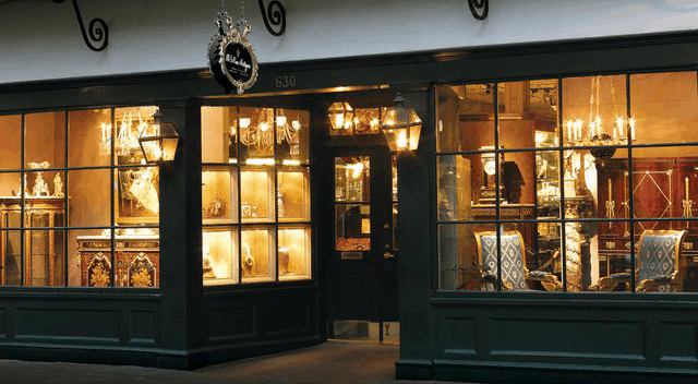 Customer Story: How M.S. Rau Antiques in New Orleans Acquires Affluent Clientele 2 Glowing Storefront with Lanterns